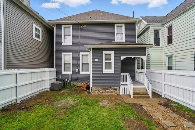 517 S Champion Ave, Columbus, OH 43205 - rear view of house with a fenced backyard and covered porch
