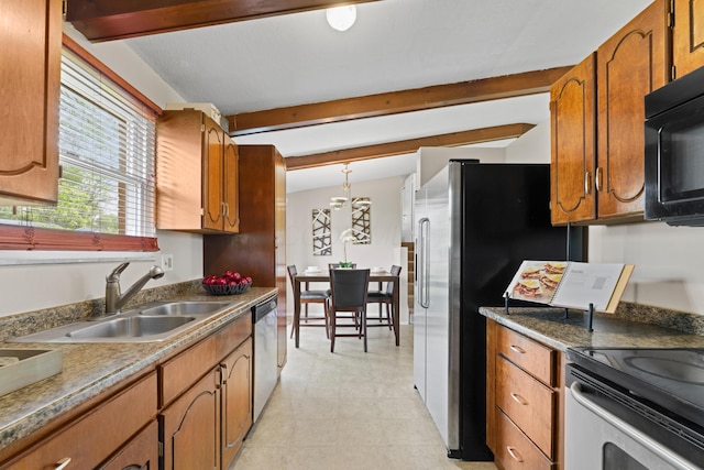 4930 Carbondale Dr, Columbus, OH 43232 - kitchen with a sink, stainless steel appliances, brown cabinets, beam ceiling, and hanging light fixtures