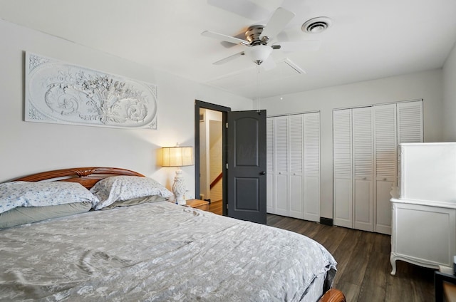 538 S Otterbein Ave Unit 2E, Westerville, OH 43081 - bedroom with two closets, wood finished floors, and a ceiling fan