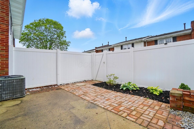 538 S Otterbein Ave Unit 2E, Westerville, OH 43081 - fenced backyard with a patio and central air condition unit