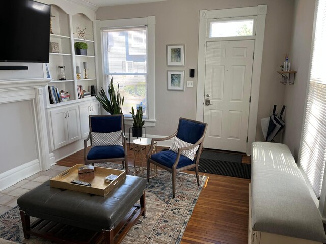 323 E Kossuth St, Columbus, OH 43206 - entryway featuring baseboards and wood finished floors