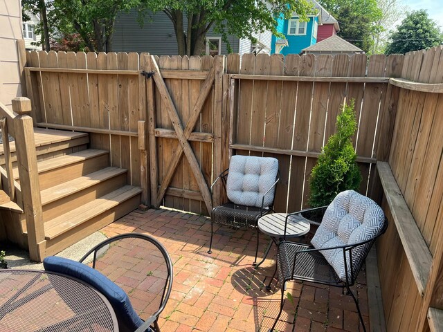 323 E Kossuth St, Columbus, OH 43206 - view of patio / terrace featuring a gate