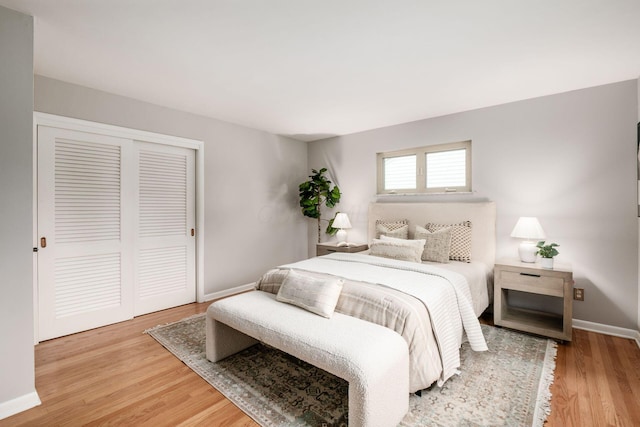 2105 Chardon Rd, Columbus, OH 43220 - bedroom with wood finished floors, a closet, and baseboards