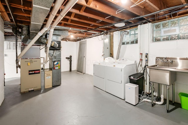 2105 Chardon Rd, Columbus, OH 43220 - below grade area featuring separate washer and dryer and a sink