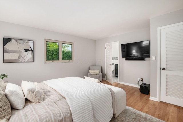 2105 Chardon Rd, Columbus, OH 43220 - bedroom with wood finished floors and baseboards