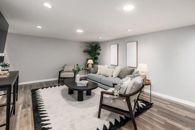 2105 Chardon Rd, Columbus, OH 43220 - living area featuring recessed lighting, wood finished floors, and baseboards