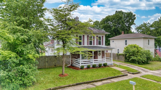 216 N St, Utica, OH 43080 - view of front of home with a porch and a chimney