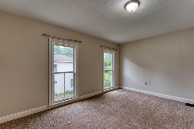216 N St, Utica, OH 43080 - unfurnished room with baseboards and carpet floors