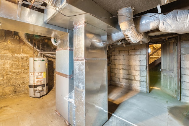 216 N St, Utica, OH 43080 - utility room featuring gas water heater and heating unit