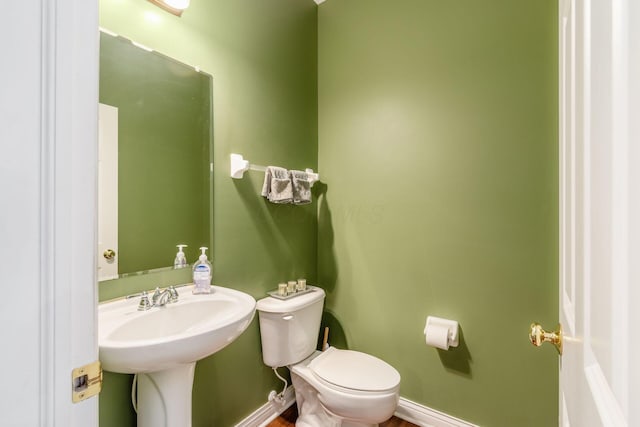 5673 Sugarwood Dr, New Albany, OH 43054 - bathroom featuring toilet and baseboards