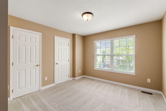 5673 Sugarwood Dr, New Albany, OH 43054 - unfurnished bedroom with carpet and baseboards