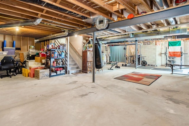 5673 Sugarwood Dr, New Albany, OH 43054 - unfinished below grade area with stairs and gas water heater