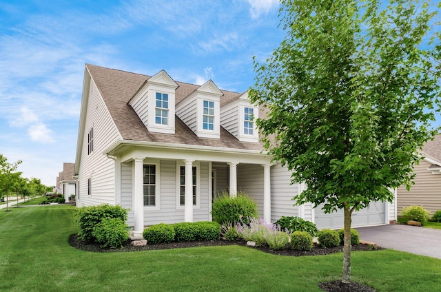 7839 Eastcross Dr, New Albany, OH 43054 - cape cod home with a front lawn, asphalt driveway, a garage, a shingled roof, and a porch