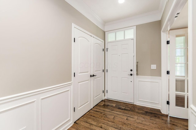 7839 Eastcross Dr, New Albany, OH 43054 - entryway with ornamental molding, wainscoting, dark wood-type flooring, and a decorative wall