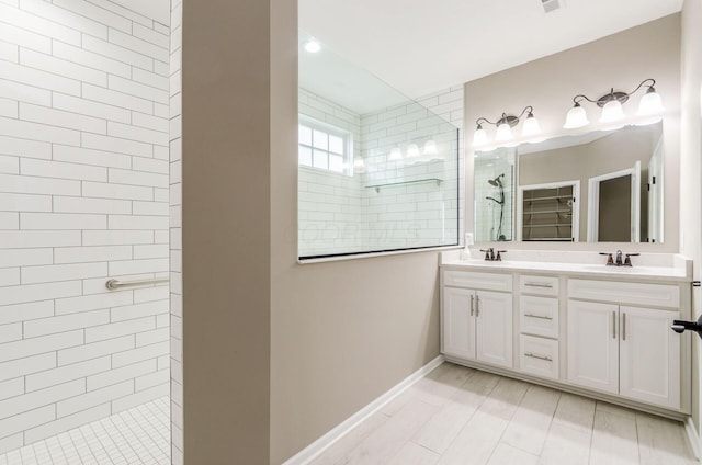 7839 Eastcross Dr, New Albany, OH 43054 - full bath with walk in shower, double vanity, baseboards, and a spacious closet