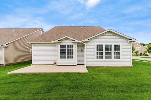 7839 Eastcross Dr, New Albany, OH 43054 - back of house with a shingled roof, a patio, and a yard