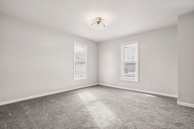 1598 Harvard Ave, Columbus, OH 43203 - spare room featuring carpet flooring and baseboards