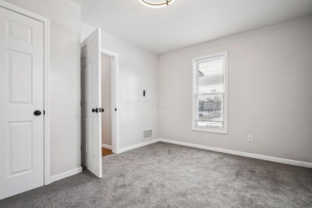 1598 Harvard Ave, Columbus, OH 43203 - unfurnished bedroom with carpet and baseboards