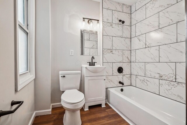 1598 Harvard Ave, Columbus, OH 43203 - full bath with wood finished floors, toilet, vanity, and shower / bath combination