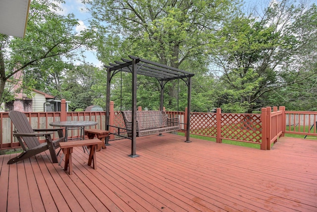 883 Mcnaughten Rd, Columbus, OH 43213 - deck with a pergola, outdoor dining area, and view of wooded area