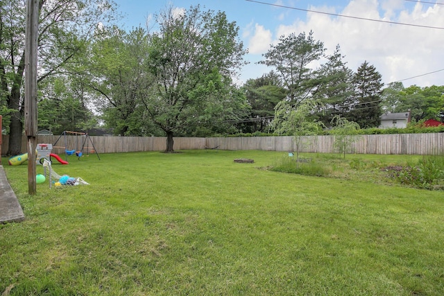 883 Mcnaughten Rd, Columbus, OH 43213 - fenced backyard featuring a playground