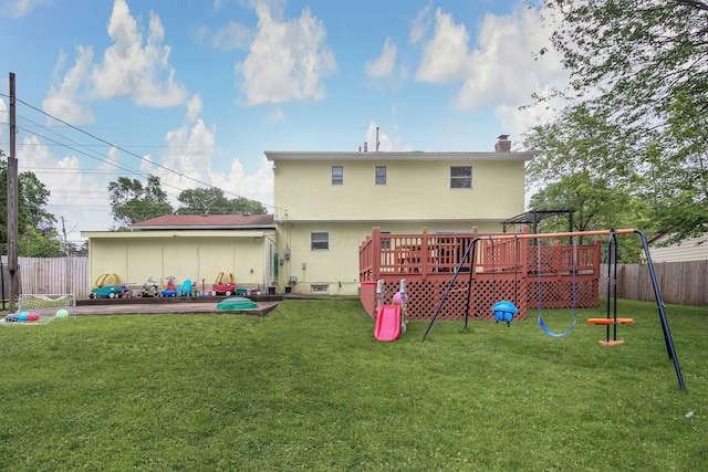 883 Mcnaughten Rd, Columbus, OH 43213 - back of house featuring a playground, a wooden deck, a chimney, and a patio