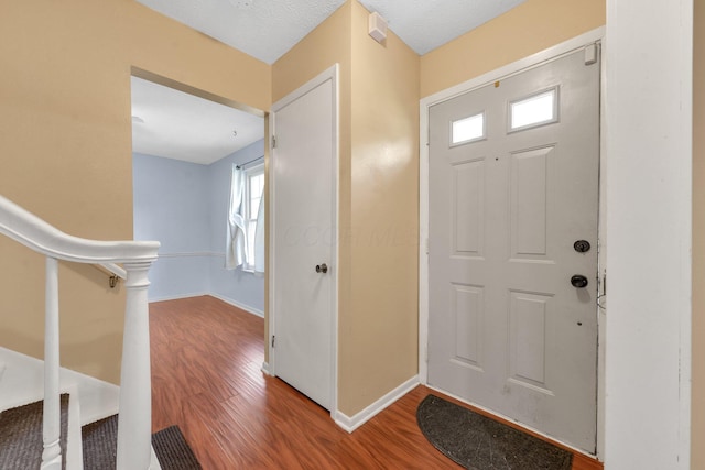 883 Mcnaughten Rd, Columbus, OH 43213 - entrance foyer with wood finished floors and baseboards