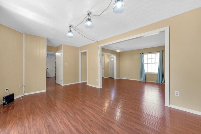 883 Mcnaughten Rd, Columbus, OH 43213 - empty room featuring wood finished floors and baseboards