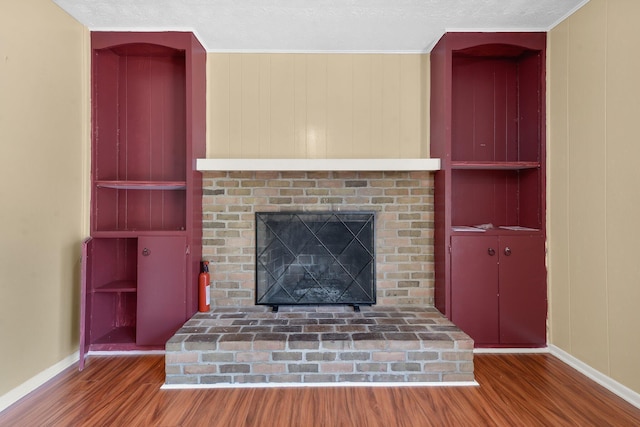 883 Mcnaughten Rd, Columbus, OH 43213 - detailed view of wood finished floors and a fireplace