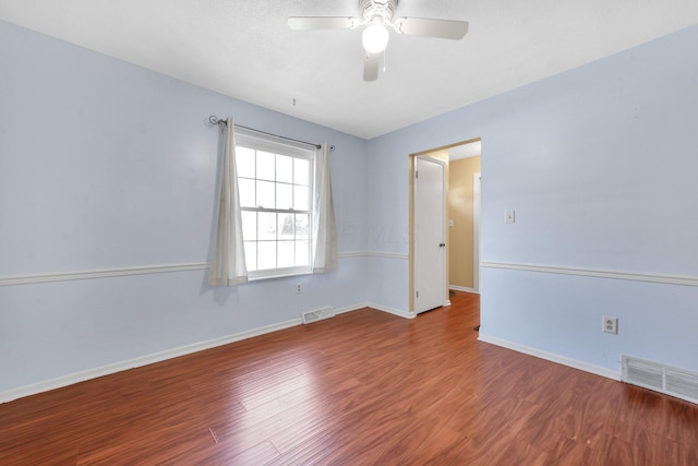 883 Mcnaughten Rd, Columbus, OH 43213 - unfurnished room featuring wood finished floors and ceiling fan