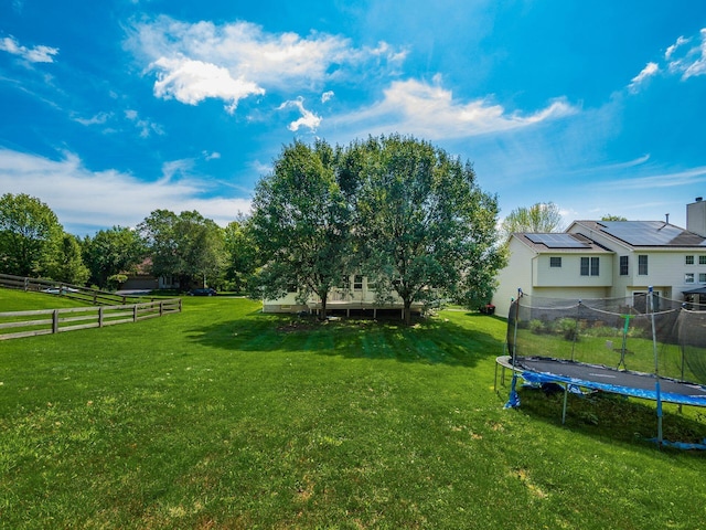 263 Timber Hearth Ct, Newark, OH 43055 - view of yard featuring a trampoline