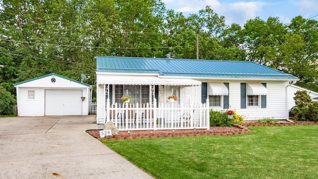 524 Ridgefield Rd, Newark, OH 43055 - ranch-style home with an outdoor structure, a front yard, a detached garage, and metal roof