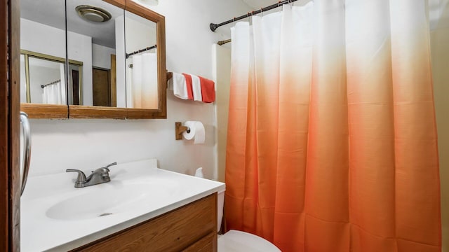 524 Ridgefield Rd, Newark, OH 43055 - bathroom with vanity, toilet, and curtained shower