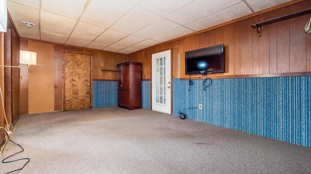 524 Ridgefield Rd, Newark, OH 43055 - unfurnished living room featuring carpet floors and wood walls