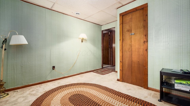 524 Ridgefield Rd, Newark, OH 43055 - hall with carpet, a paneled ceiling, and baseboards