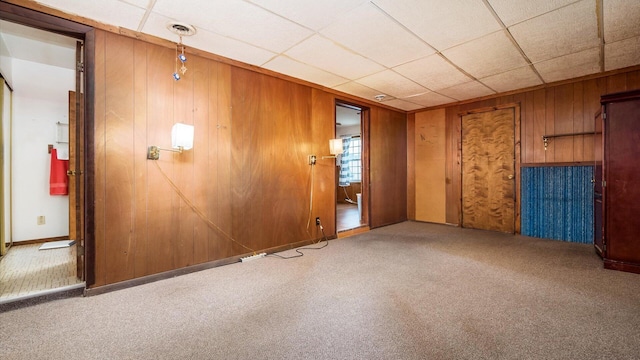 524 Ridgefield Rd, Newark, OH 43055 - spare room with wooden walls and carpet