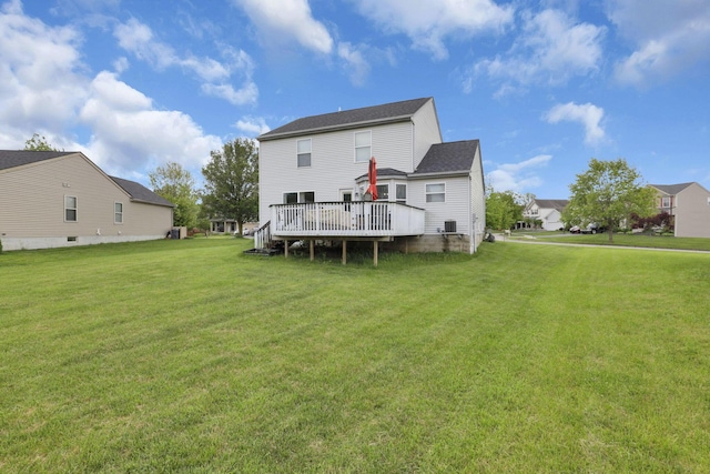 226 Purple Finch Loop, Pataskala, OH 43062 - back of property featuring a wooden deck, a yard, and central air condition unit