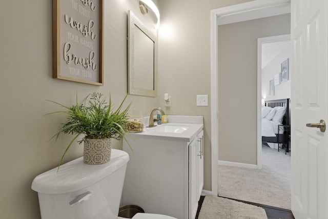 226 Purple Finch Loop, Pataskala, OH 43062 - bathroom with toilet, vanity, and baseboards