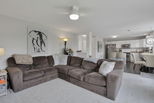 226 Purple Finch Loop, Pataskala, OH 43062 - living room featuring a textured ceiling and a ceiling fan