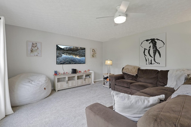 226 Purple Finch Loop, Pataskala, OH 43062 - living room featuring carpet flooring, ceiling fan, a textured ceiling, and baseboards