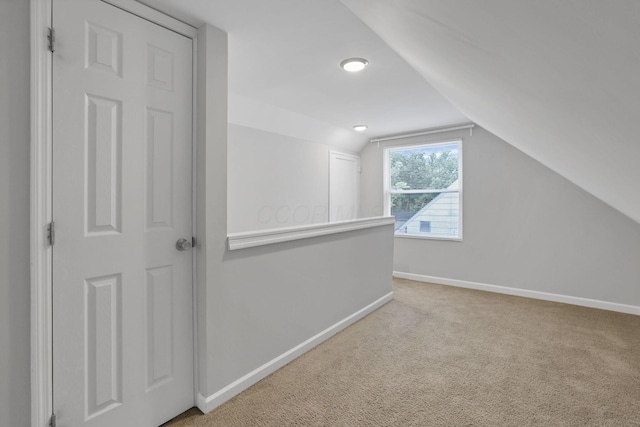 2538 Lexington Ave, Columbus, OH 43211 - additional living space featuring baseboards, carpet, and lofted ceiling