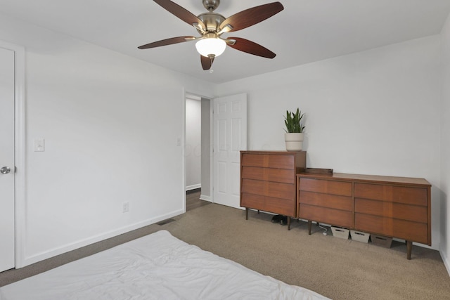 2538 Lexington Ave, Columbus, OH 43211 - carpeted bedroom featuring baseboards and ceiling fan