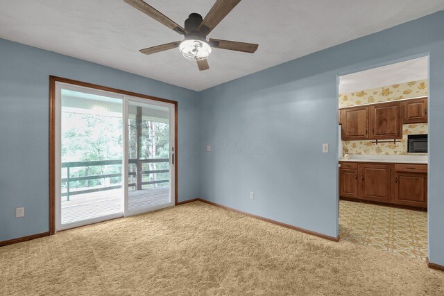 363 Carroll Eastern Rd NW, Baltimore, OH 43105 - empty room with ceiling fan and baseboards