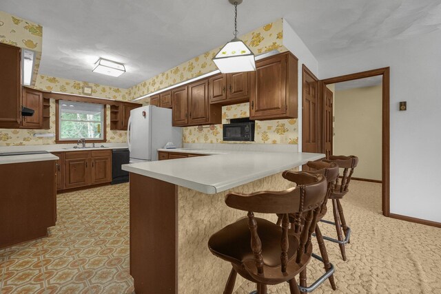 363 Carroll Eastern Rd NW, Baltimore, OH 43105 - kitchen featuring black appliances, wallpapered walls, open shelves, a sink, and a peninsula