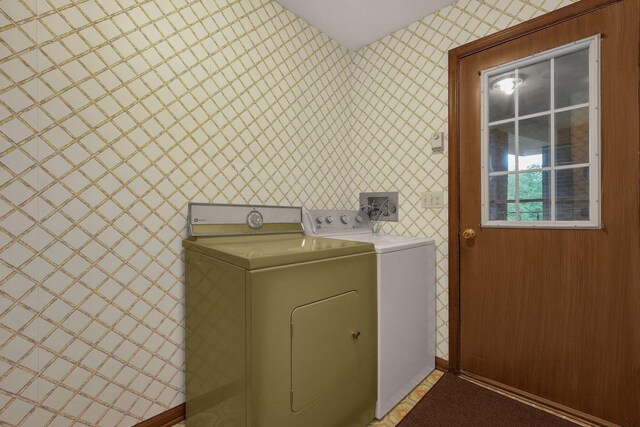 363 Carroll Eastern Rd NW, Baltimore, OH 43105 - laundry room featuring wallpapered walls, separate washer and dryer, and baseboards