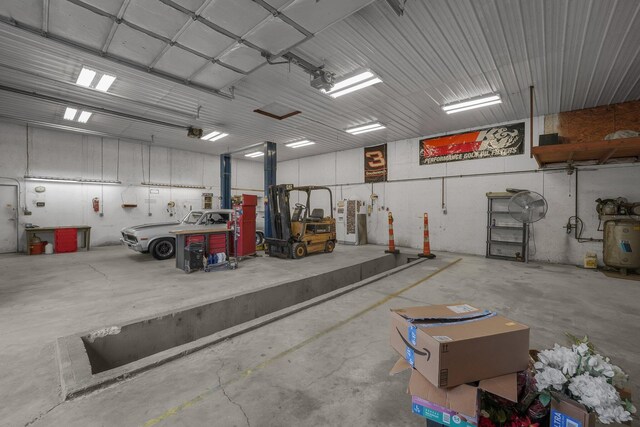 363 Carroll Eastern Rd NW, Baltimore, OH 43105 - garage featuring a garage door opener