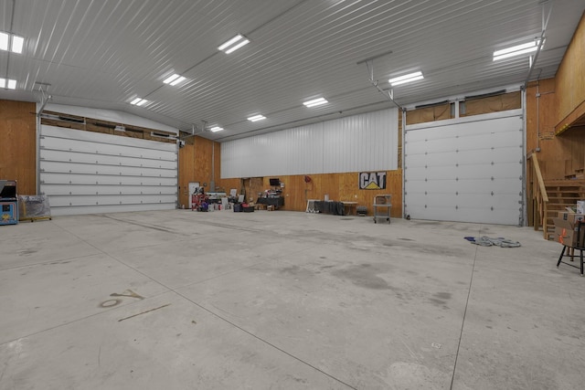 363 Carroll Eastern Rd NW, Baltimore, OH 43105 - garage featuring wood walls