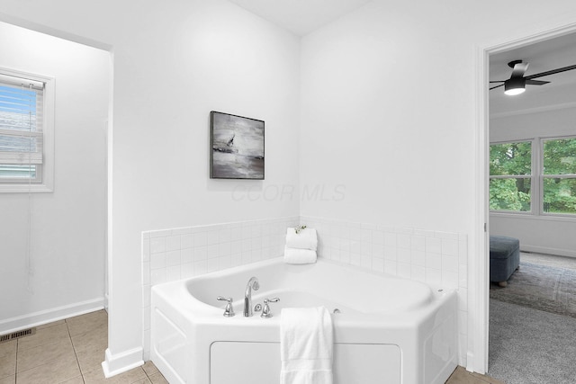 1825 Itawamba Trl, London, OH 43140 - full bathroom featuring a bath, tile patterned floors, ceiling fan, baseboards, and connected bathroom