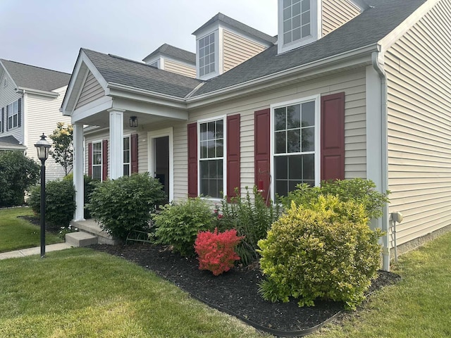 6641 Steen St, Canal Winchester, OH 43110 - view of side of home with a yard and a shingled roof