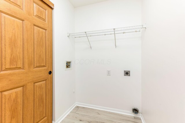 6641 Steen St, Canal Winchester, OH 43110 - laundry room with electric dryer hookup, hookup for a washing machine, and light wood finished floors